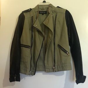 Green army jacket with leather sleeves